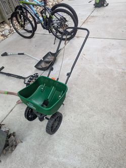 Yard items - seed spreader, stamper, edger