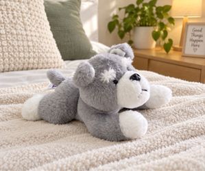 Cute gray-and-white plush husky dog