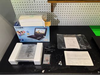 COBY TFDVD7009 7in Portable DVD Player Region 1 Remote, DVD/CD Playback