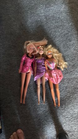 Three girl Barbie dolls