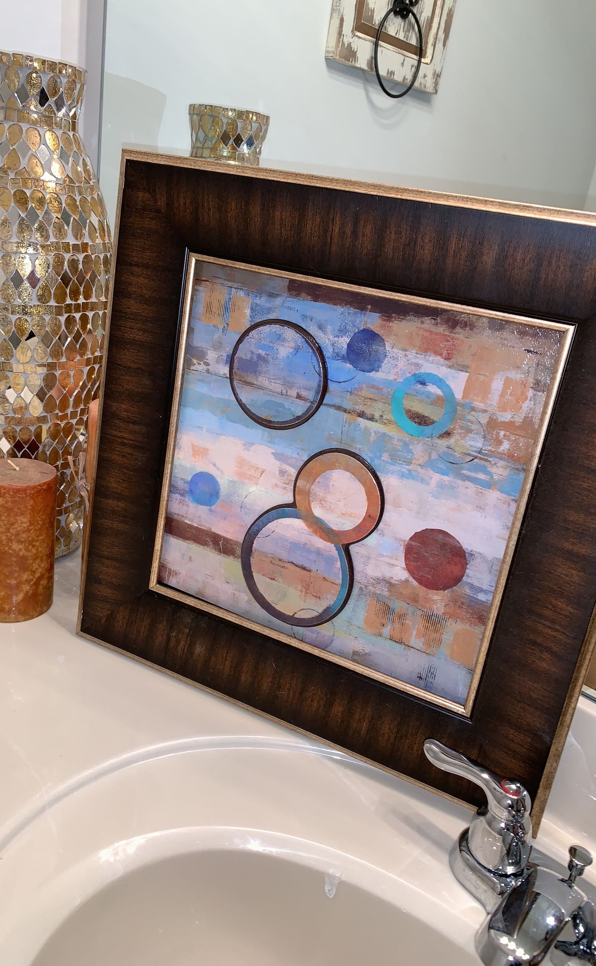 A set of two beautifully framed wall art. 55