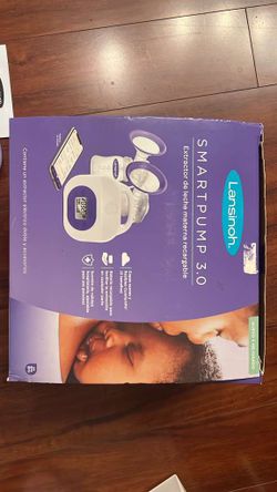 Portable breast pump