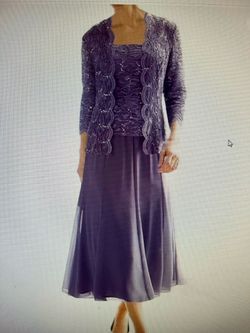 Beautiful got sequined jacket.  Never worn.