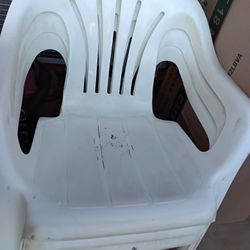 8 White Plastic Chairs 