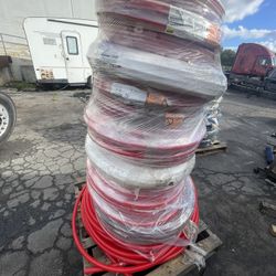 Water hoses   Red.  Blue.  White.  Yellow.  By peace or all