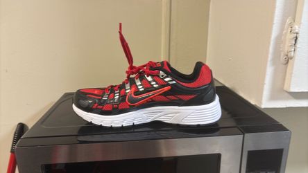 Black gray, and white Nikes