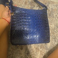 Blue embossed leather crossbody bag. 