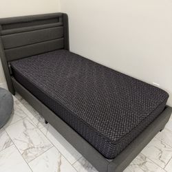 Twin size bed frame with mattress