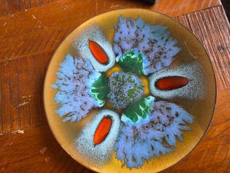 +1                    This is a vintage Mid-Century Modern enamel on copper decorative plate created by artist Edward Star