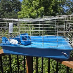 small animal cage with accessories 