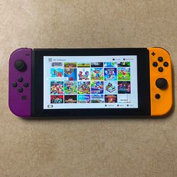 NINTENDO SWITCH V2 with 100 SWITCH GAMES MARIO KART,MARIO PARTY,MARIO DELUXE,MARIO 3D WORLD,ZELDA,POKEMON