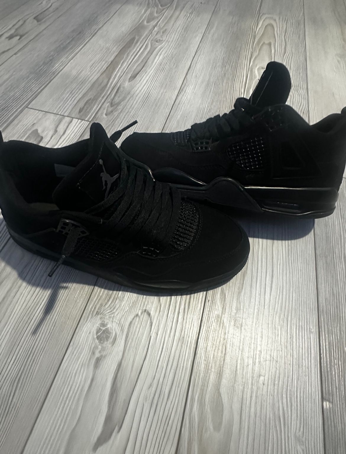 Jordan 4s black cats