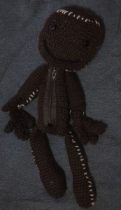 Hand/Custom-made amigurumi crotchet plush of Sackboy, the iconic main protagonist from PlayStation's LittleBigPlanet video game series / Gamer Gift

I