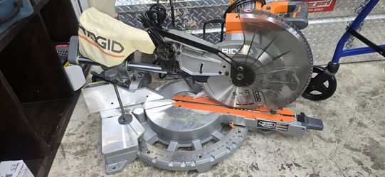 RIDGID 12" DUAL BEVELED COMPOUND SLIDING MITER SAW 210$