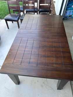 Wooden table with 6 chairs