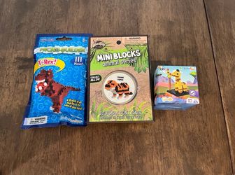 Lot of three animal mini building blocks sets T-Rex, tiger, and giraffe