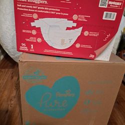 2 Boxes Of Diapers. 