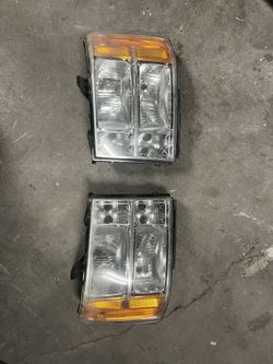 GMC Sierra OEM headlights