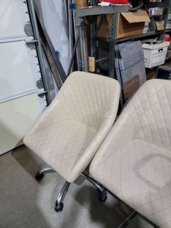 Off white. Customer chairs