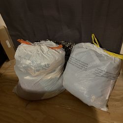 2 bags of women plus size jeans,shirts n blouses from 2x n 3x jeans some jeans size 24 & 26