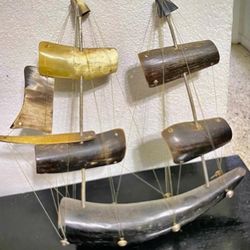 BARCO DE VELA DE TARROS DE VACAS