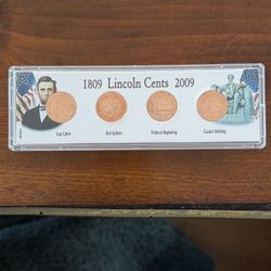 4-coin set of 2009 Lincoln Bicentennial cents featuring different reverse designs representing stages of Abraham Lincoln's life.