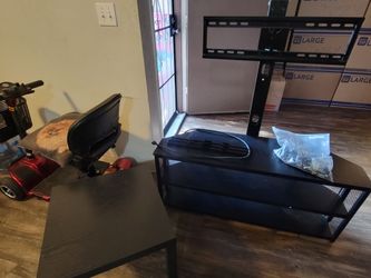 MOVING SALE MOVING SALE Rolanstar TV Stand with Mount and Power Outlet, Swivel TV Stand with table