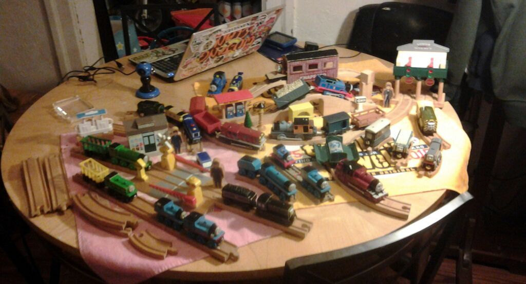 Thomas the train and friends. ..very nice layout, stations,crossing gates,general store plus more