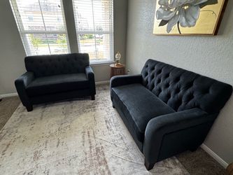 2 loveseats, sofas; in very good condition, comfortable, clean, no bad odors, and neither torn nor worn.