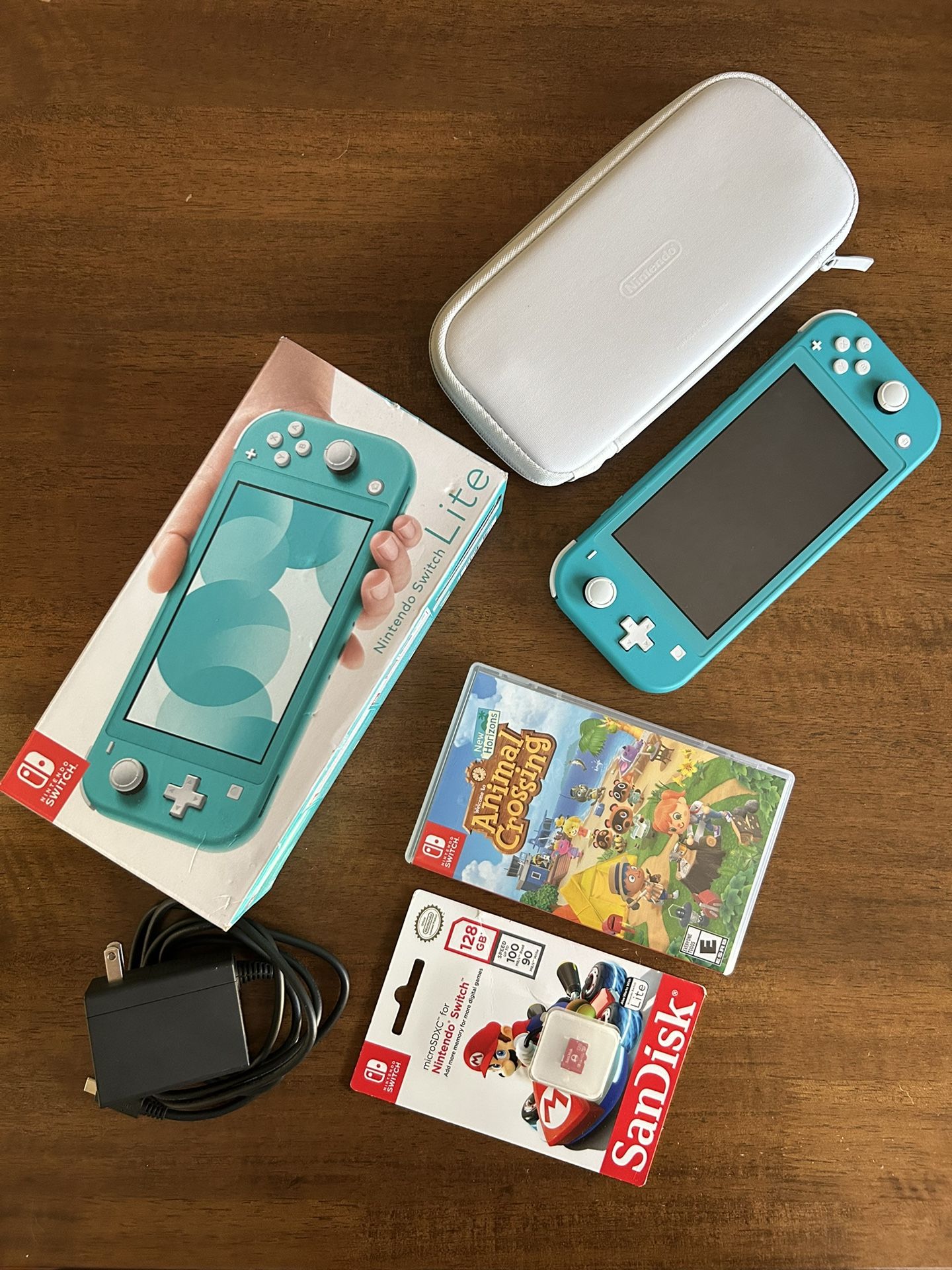 Nintendo Switch Lite (Blue) + Animal Crossing Game, Memory Card, & Travel Case