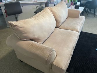 Tan pullout sofa
