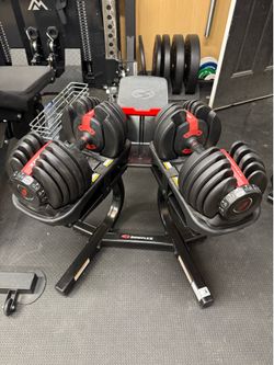 Bowflex dumbbells with stand