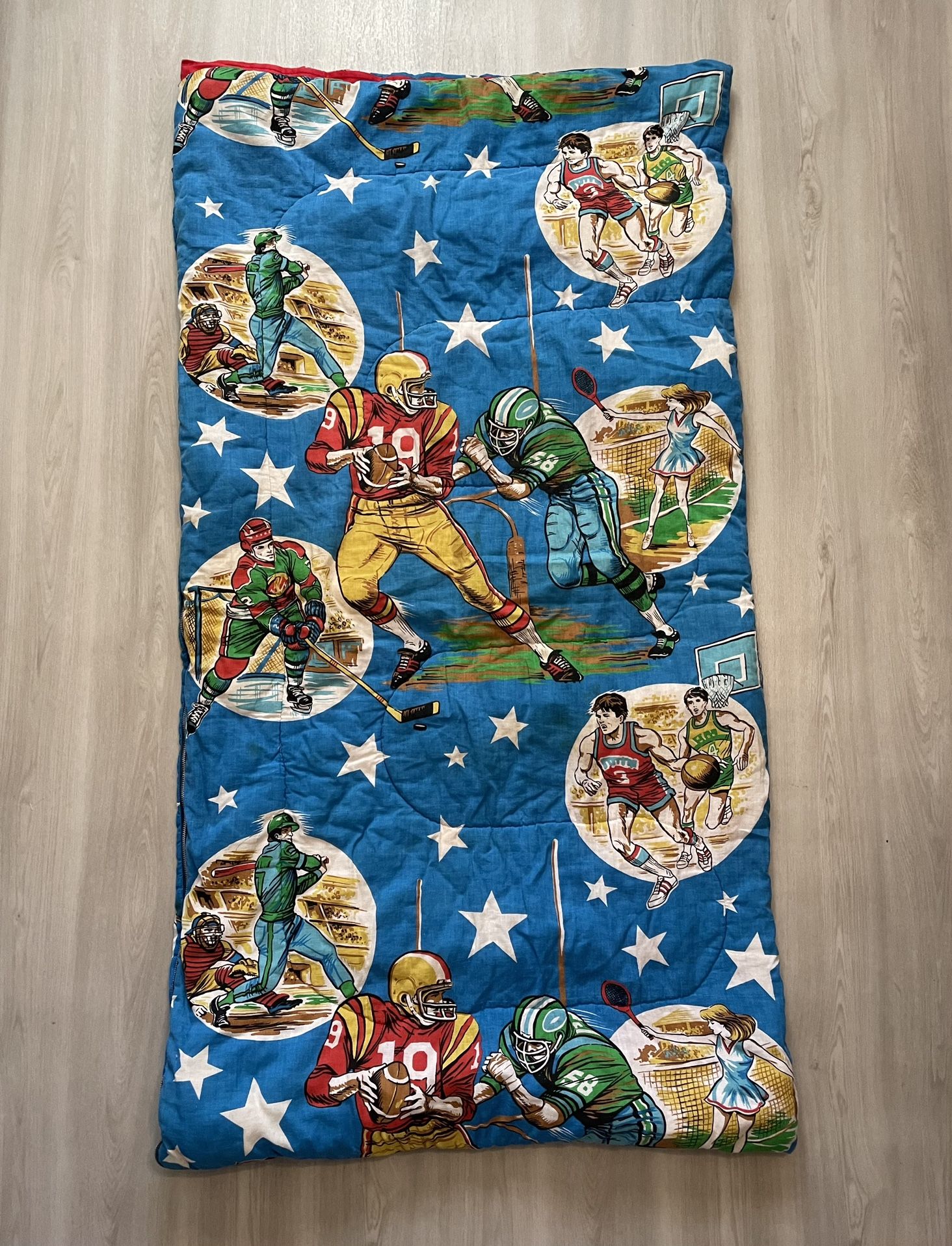 Vintage 70s NFL NBA NHL MLB Sports Sleeping Bag 32x59 Closed One of the zipper end is broken. Still can be opened and closed. Small holes and tears in