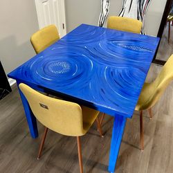 One of kind kitchen table with 4 designer chairs
