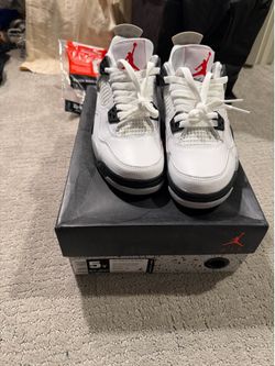 Jordan 4s white cement back tap cracking