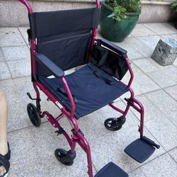 Transport wheelchair
