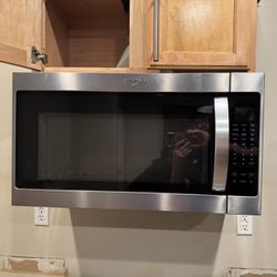 Whirlpool 2.1-cu ft Over-the-Range Microwave - $100