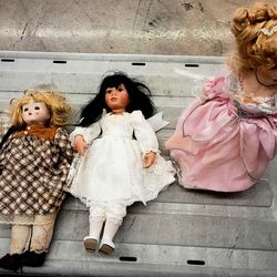 Vintage porcelain dolls 1 of them play music