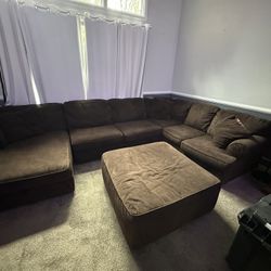 Brown Sectional Couch And Ottoman
