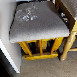Glider with ottoman