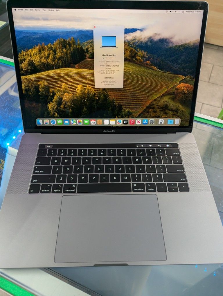 MacBook Pro 2018 15" Touch Bar Retina Intel 6 Core i7 16gb Ram 512GB SSD macOS Sonoma Charger 

There is a white spot on the screen and visible only o