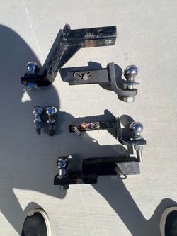 Trailer hitch ball mounts