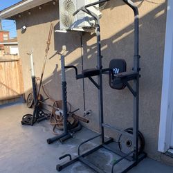 bench rack with weights and pull up/dip bar