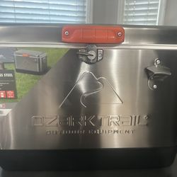 OZARK TRAIL 54 QUART STAINLESS STEEL COOLER WITH BUILT-IN BOTTLE OPENER