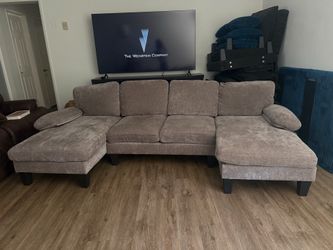 U-shaped sectional sofa, taupe, washable covers, excellent condition.