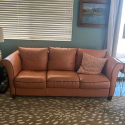 Terra Cotta Leather Couch With Black Piping