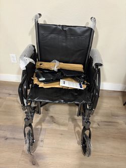 Drive Medical SSP218DDA-SF Silver Sport 2 Folding Wheelchair, Black Lightweight Folding Wheelchair Features Detachable Desk Arms and Swing Away Footre