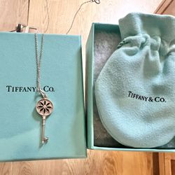 Tiffany Daisy key with Small Diamond Center 