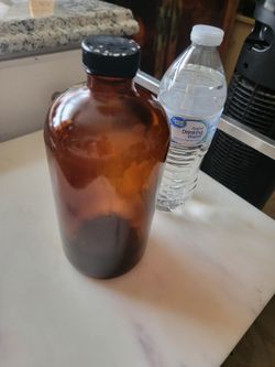 32oz vintage Amber cosmo oval bottle