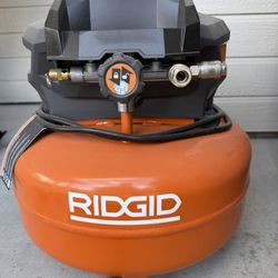 RIGID 6 Gal. 150 PSI Electric Air Compressor With 25 Ft Hose And Nail Guns